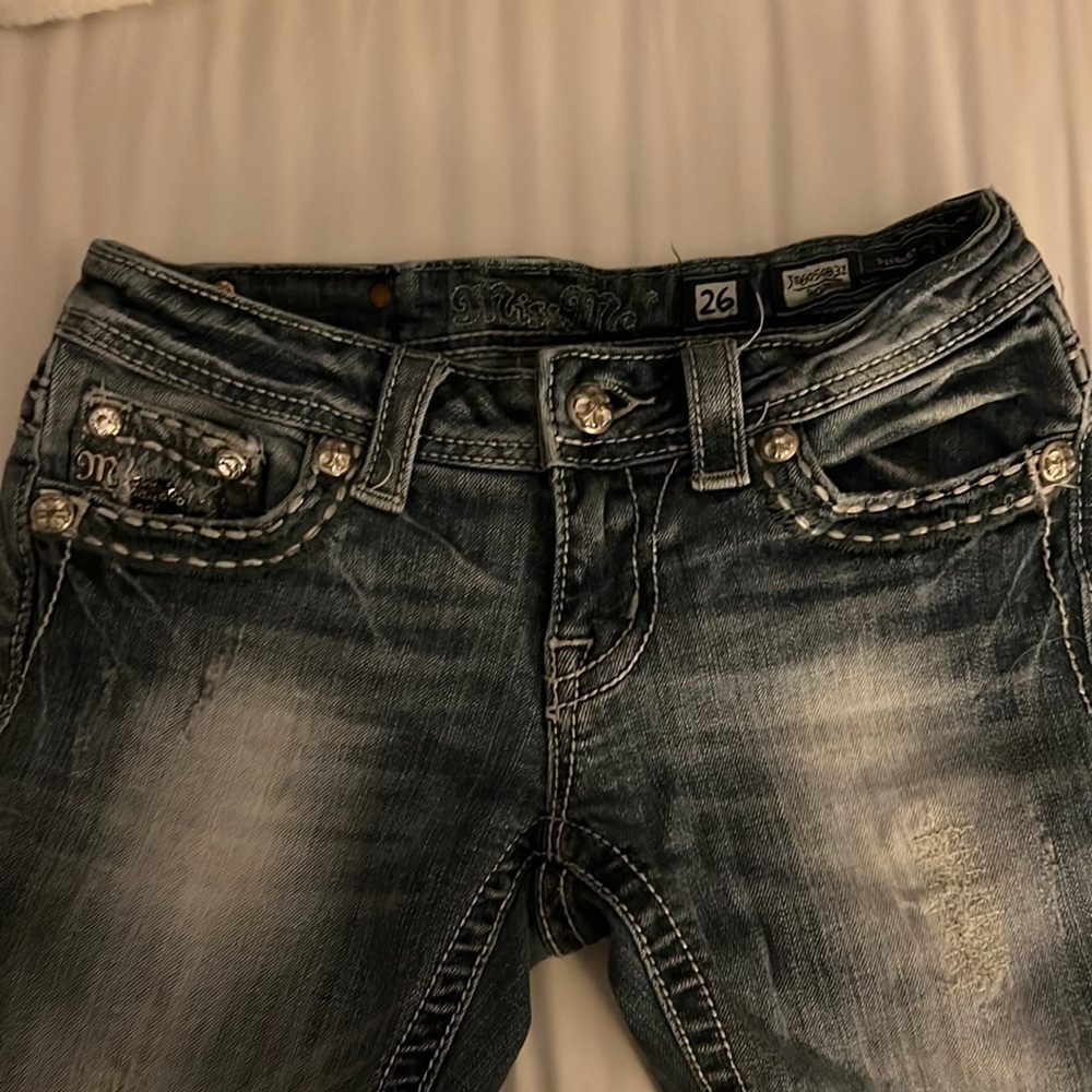 Miss Me Jeans 26 X 36. Blue w/fading and slight distress,no holes. Boot cut.